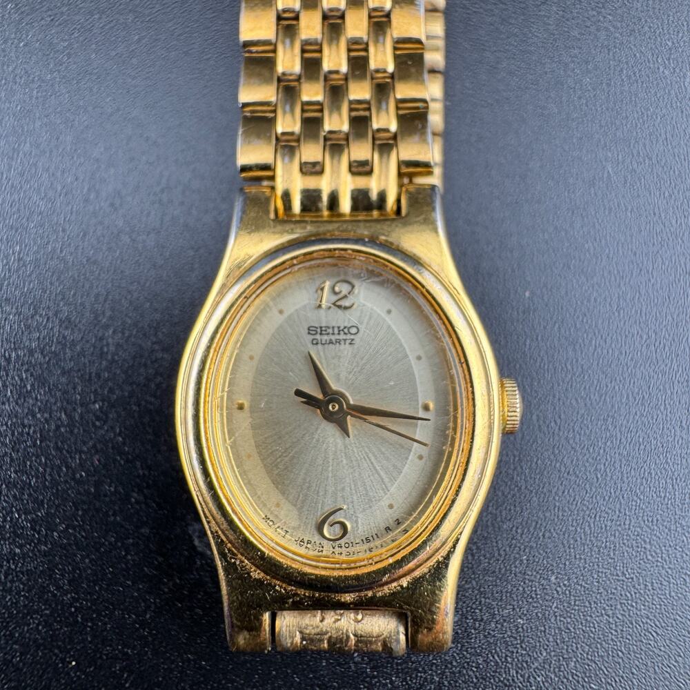 Seiko Quartz Ladies Gold-Tone Oval Watch Panel Link Band